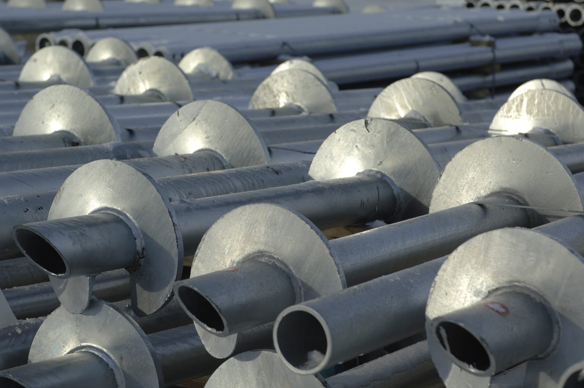 Galvanized residential helical piers with helix plates